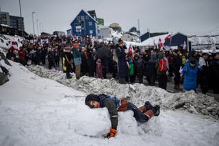 People attend a protest against US president Donald Trump's demand that the Arctic island be ceded to the U.S., calling for it to be allowed to determine its own future